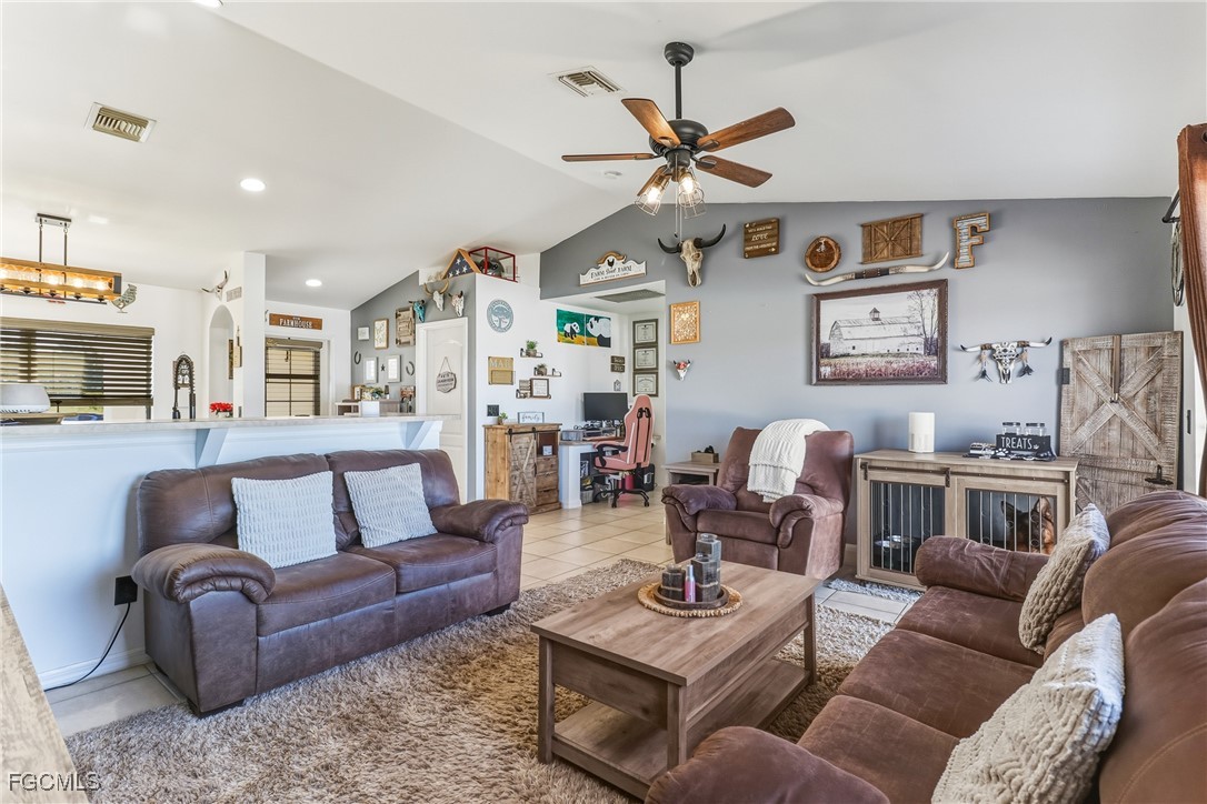 3910 23rd Street Southwest Lehigh Acres, FL 33976 - Photo 12 of 29 a living room with furniture