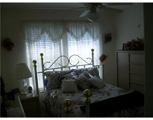 a view of swimming pool with a yard