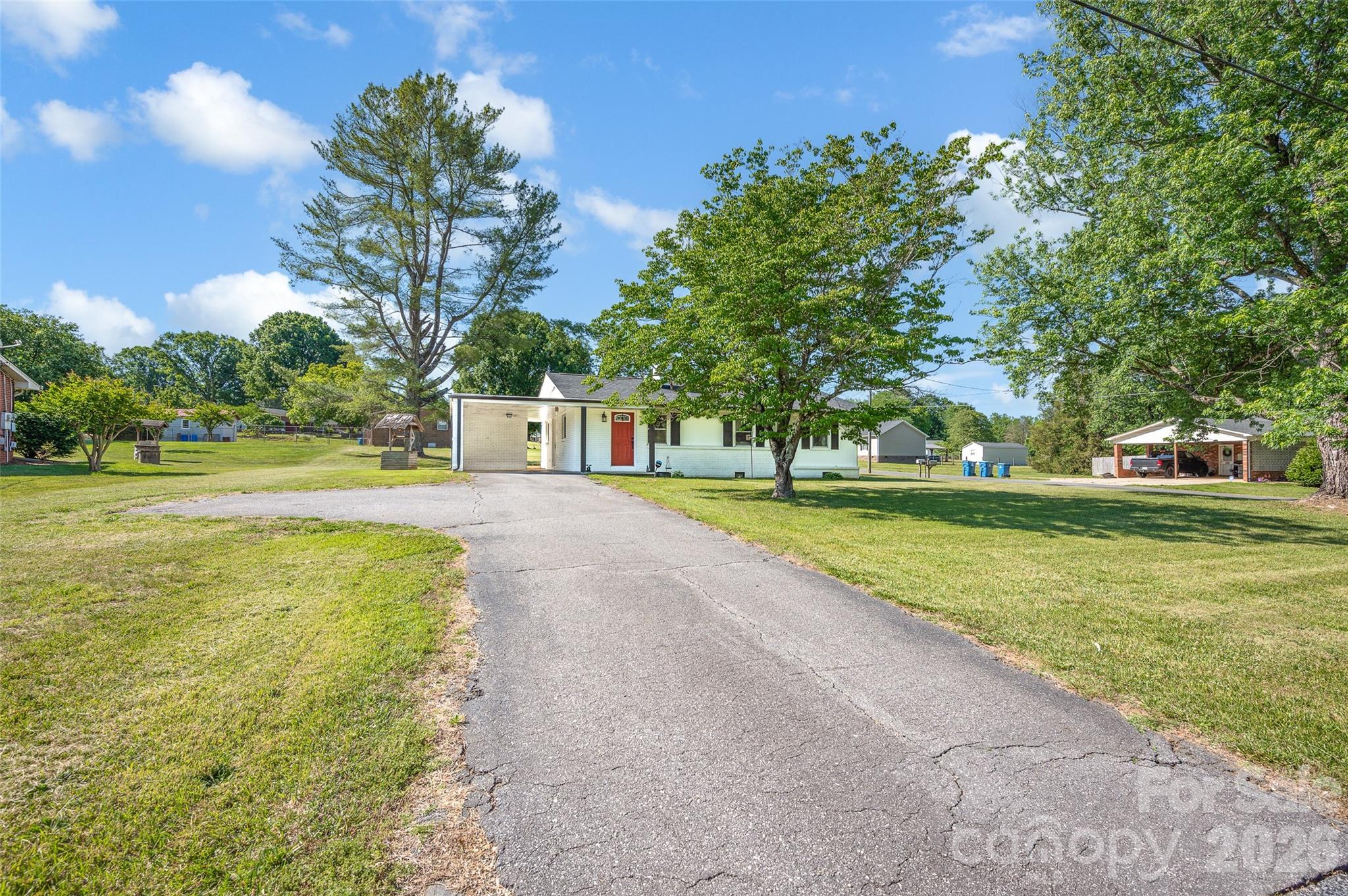 3033 West Highway 10 Conover, NC 28613 - Photo 3 of 26 a house view with a garden space