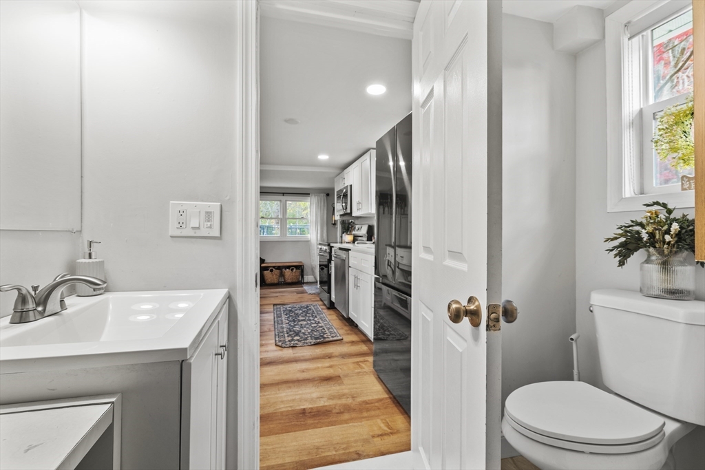 90 R Bartlett Road Plymouth, MA 02360 - Photo 12 of 35 a bathroom with a sink a toilet a mirror and shower