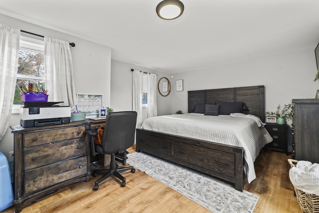 90 R Bartlett Road Plymouth, MA 02360 - Photo 13 of 35 a bedroom with a bed chair and dresser