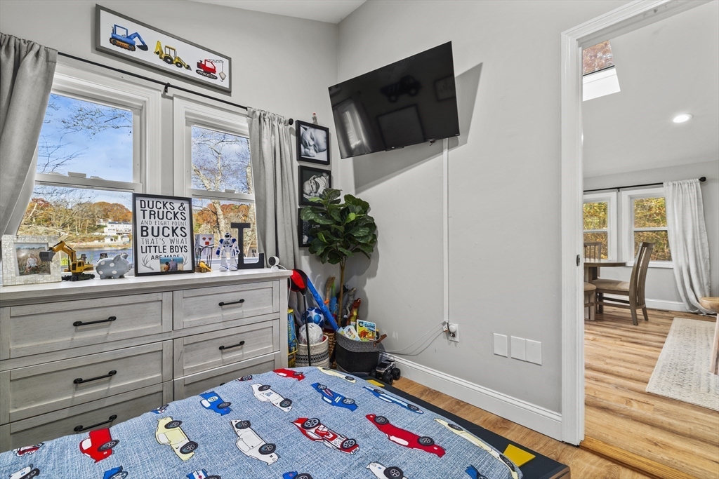 90 R Bartlett Road Plymouth, MA 02360 - Photo 18 of 35 a room with toys and flat screen tv