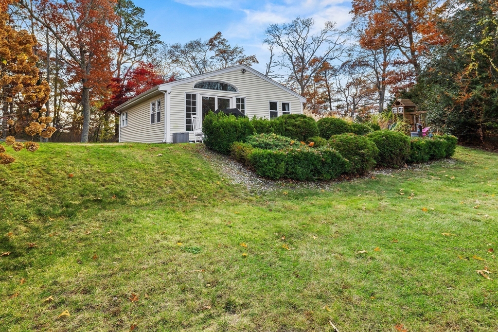 90 R Bartlett Road Plymouth, MA 02360 - Photo 24 of 35 a view of a house with backyard and garden
