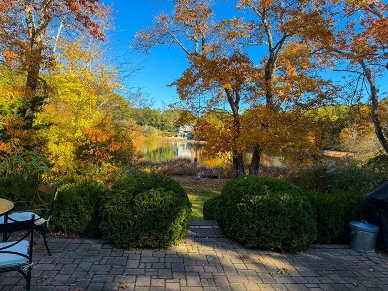 90 R Bartlett Road Plymouth, MA 02360 - Photo 25 of 35 a backyard of a house with lots of green space
