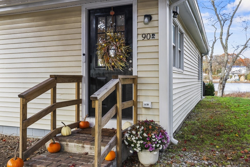 90 R Bartlett Road Plymouth, MA 02360 - Photo 7 of 35 a view of a porch with a bench