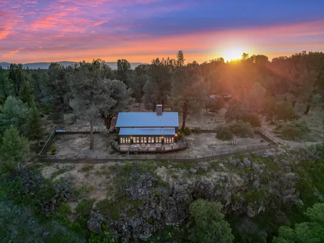 a view of a street with a building in the background