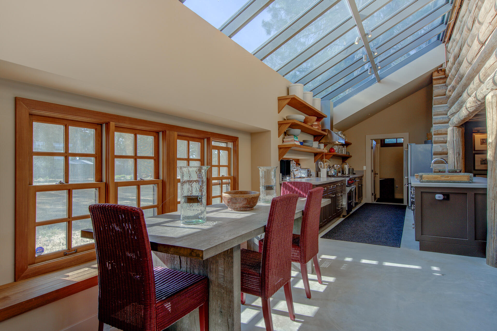 21151 Ridge Road Hat Creek, CA 96040 - Photo 22 of 68 a dining room with furniture and wooden floor