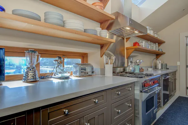 a bathroom with a sink and a window