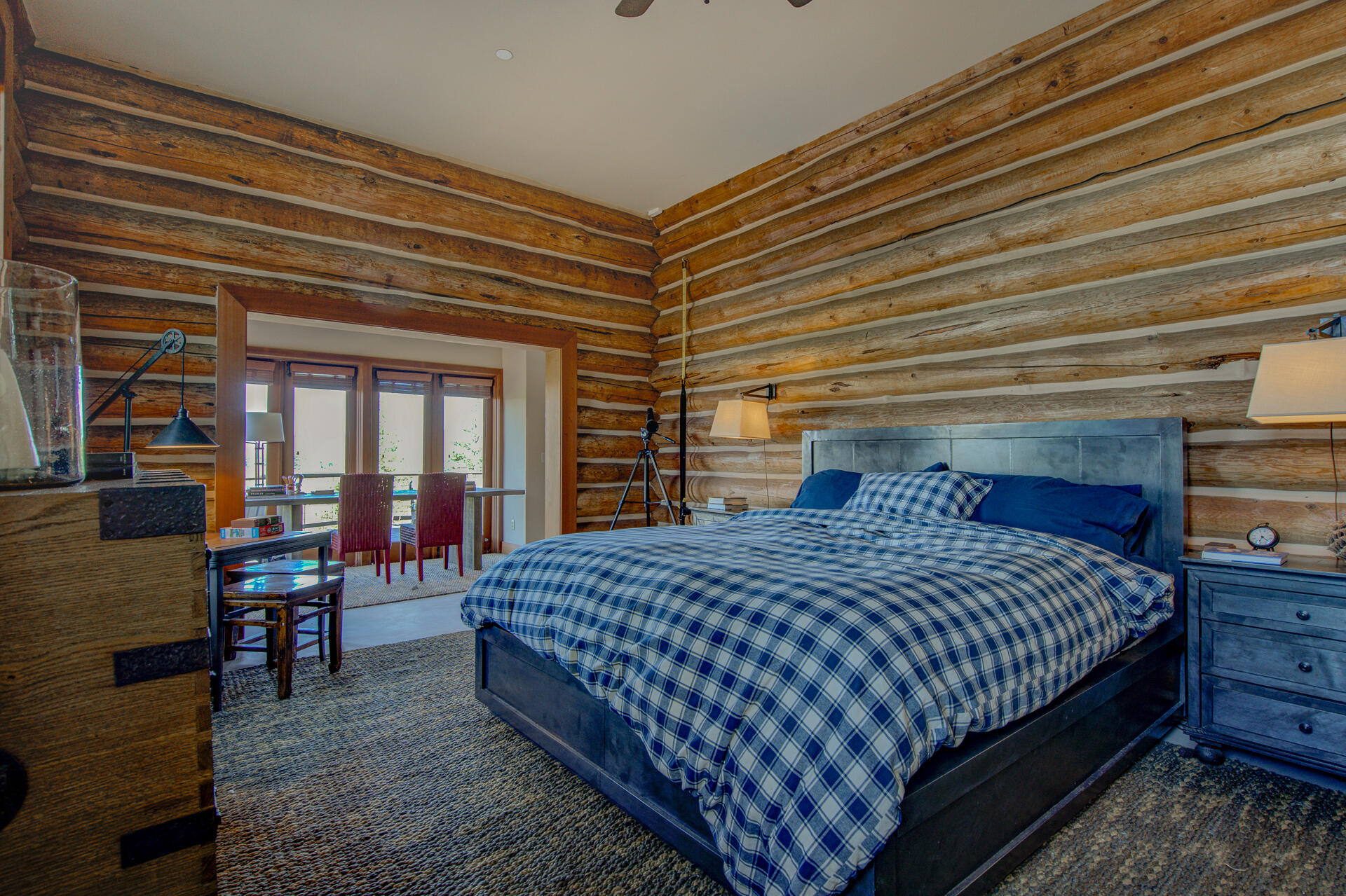 21151 Ridge Road Hat Creek, CA 96040 - Photo 37 of 68 a bedroom with a bed and wooden floor