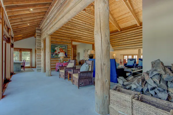a bathroom with a shower and a sink