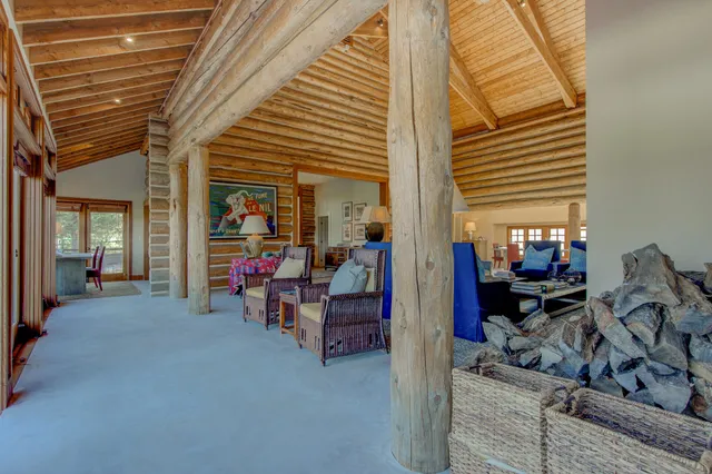 a bathroom with a shower and a sink