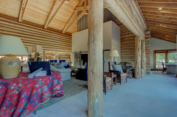 a front view of house with yard and trees