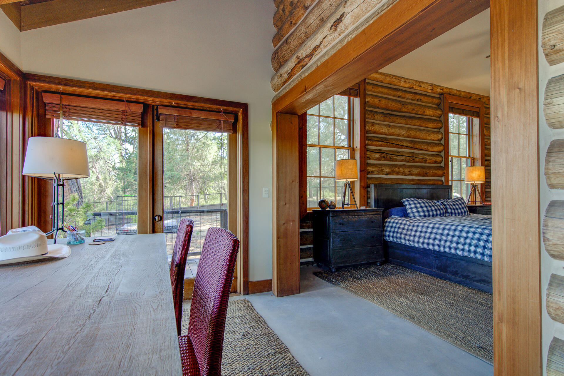 21151 Ridge Road Hat Creek, CA 96040 - Photo 45 of 68 a bedroom with furniture and a large window