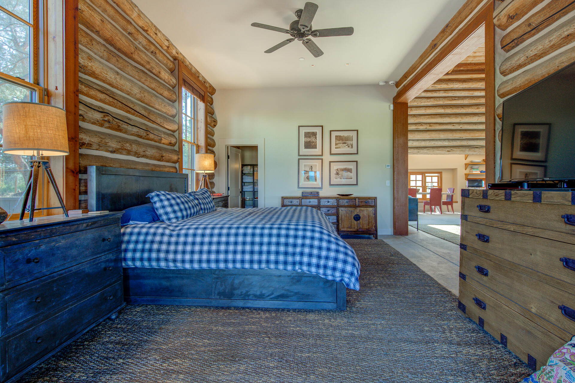 21151 Ridge Road Hat Creek, CA 96040 - Photo 46 of 68 a bedroom with a bed and wooden floor