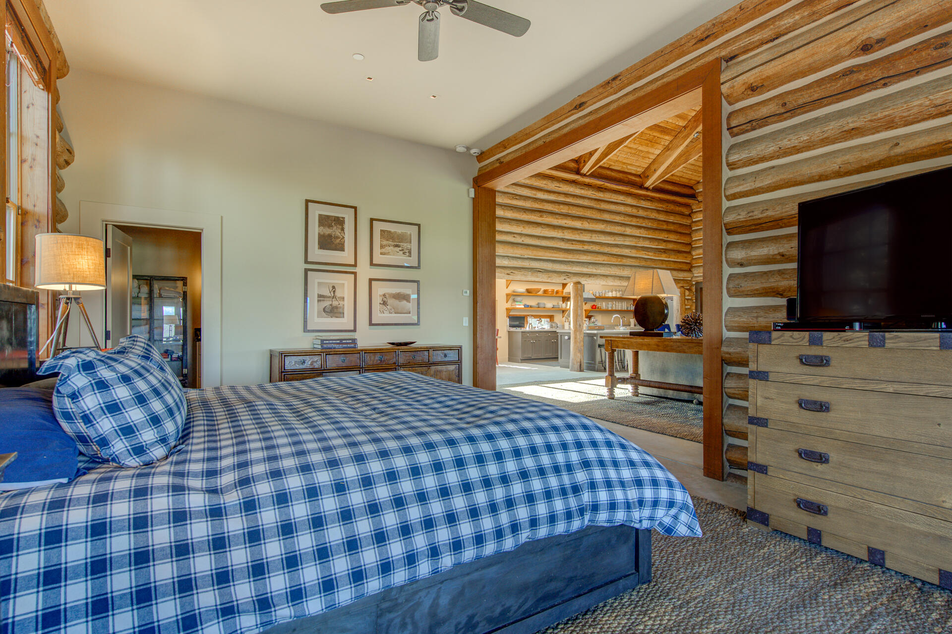 21151 Ridge Road Hat Creek, CA 96040 - Photo 47 of 68 a bedroom with a bed and flat screen tv