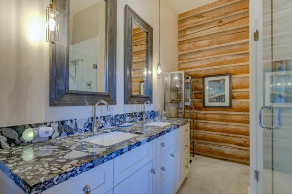 a backyard of a house with large trees