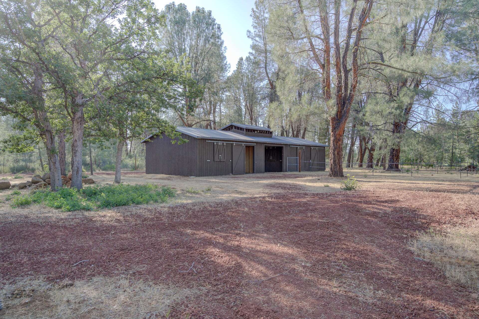 21151 Ridge Road Hat Creek, CA 96040 - Photo 56 of 68 a front view of house with yard and trees