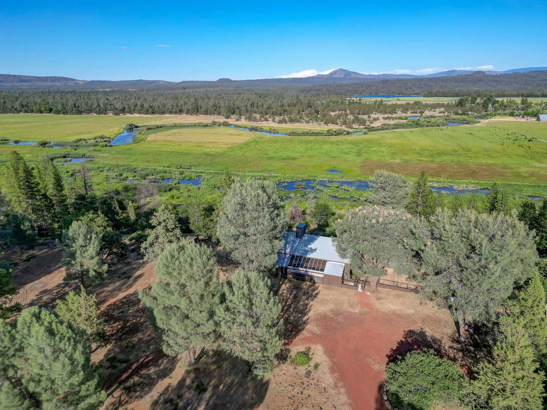 21151 Ridge Road Hat Creek, CA 96040 - Photo 6 of 68 a view of a field with an ocean view