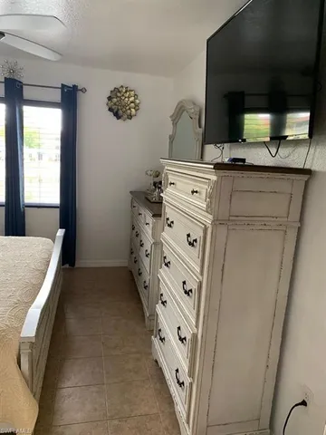 a view of bathroom with mirror