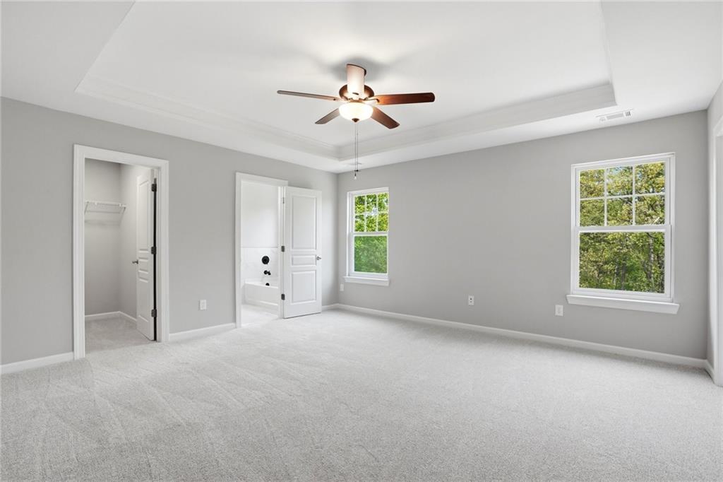 7812 Keepsake Lane Flowery Branch, GA 30542 - Photo 13 of 78 a view of an empty room with a window