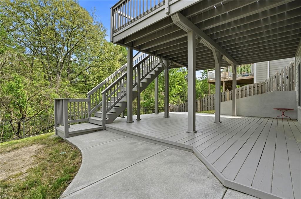 7812 Keepsake Lane Flowery Branch, GA 30542 - Photo 31 of 78 a patio with table and chairs and potted plants