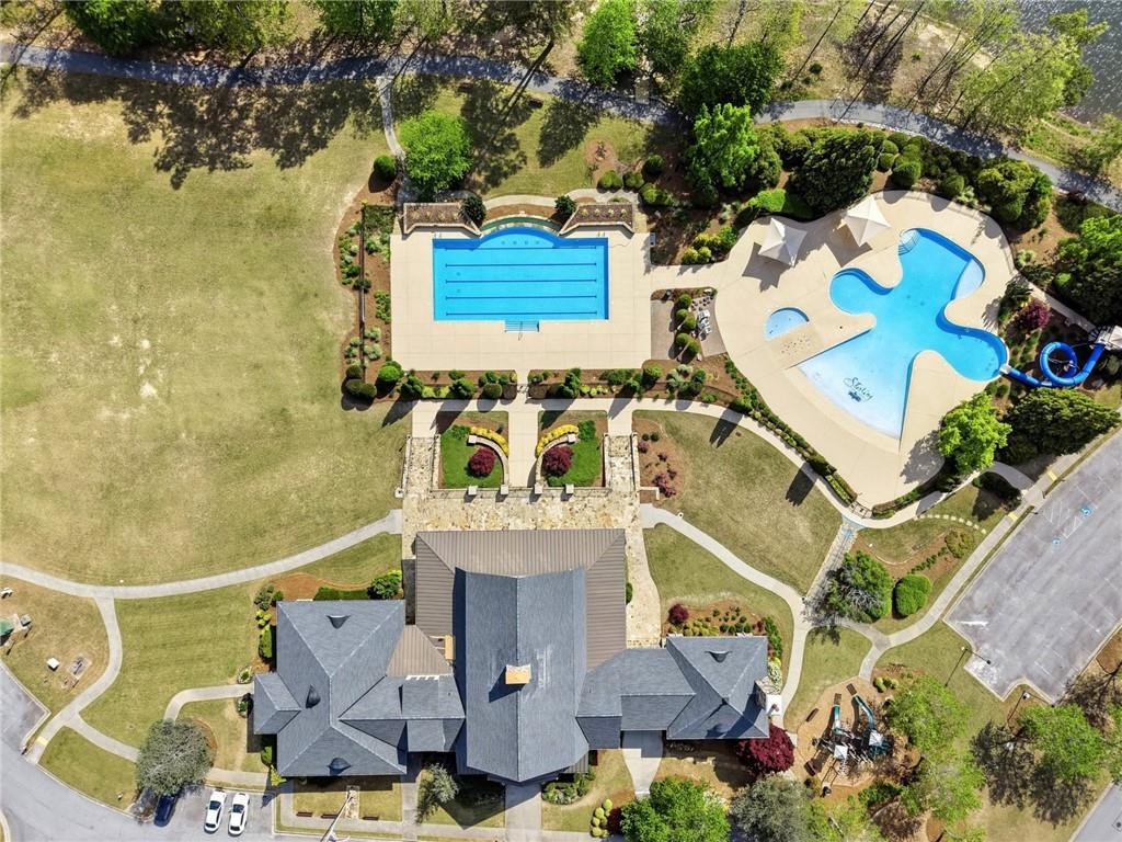 7812 Keepsake Lane Flowery Branch, GA 30542 - Photo 35 of 78 an aerial view of a house with a swimming pool