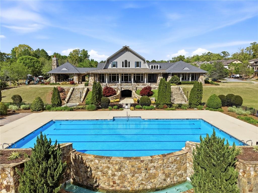 7812 Keepsake Lane Flowery Branch, GA 30542 - Photo 38 of 78 a view of a house with pool and sitting area