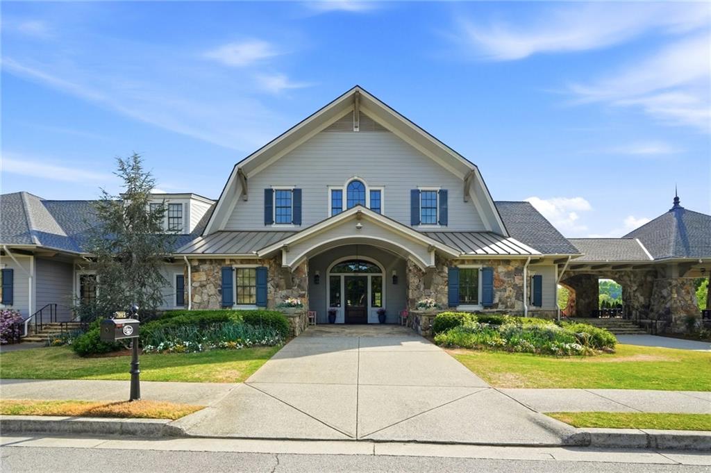 7812 Keepsake Lane Flowery Branch, GA 30542 - Photo 47 of 78 a front view of a house with a yard