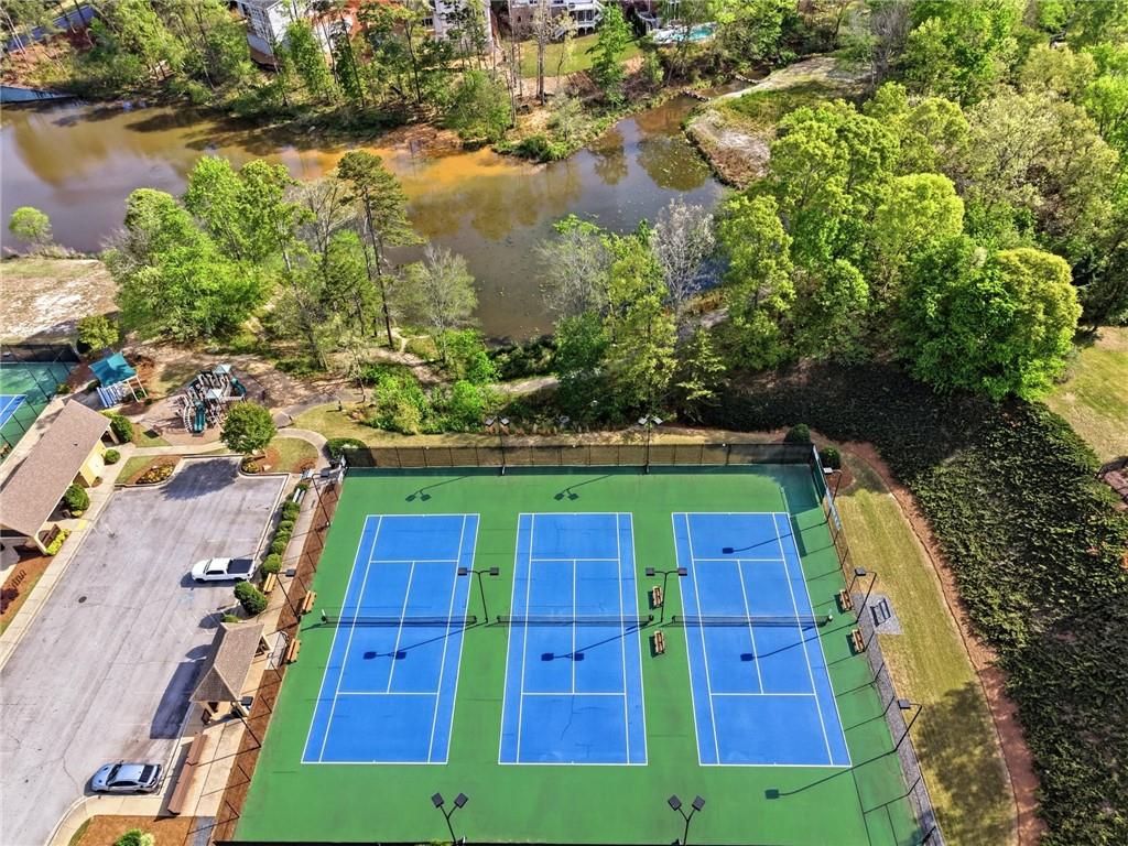 7812 Keepsake Lane Flowery Branch, GA 30542 - Photo 57 of 78 an aerial view of a yard with a lake view