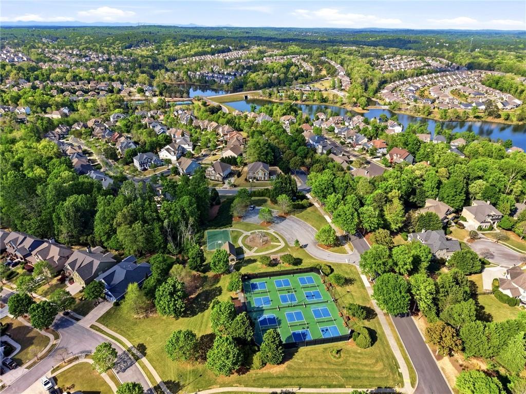 7812 Keepsake Lane Flowery Branch, GA 30542 - Photo 74 of 78 an aerial view of residential houses with outdoor space