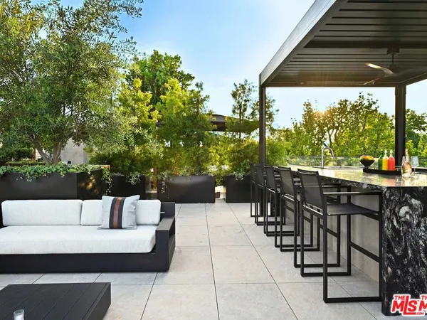 a view of backyard with furniture