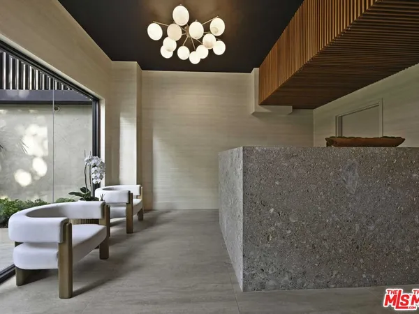 a view of a livingroom with furniture