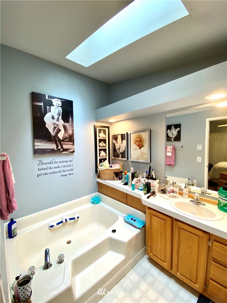 18436 Loganberry Street Southwest Rochester, WA 98579 - Photo 10 of 29 a very nice looking bedroom with a large window