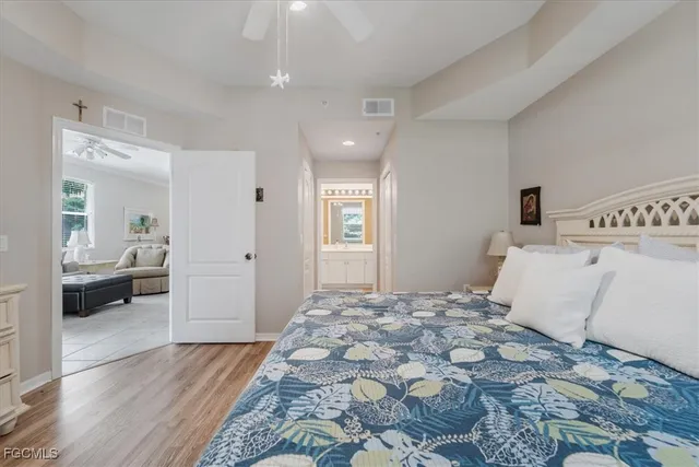 a bathroom with a window and a view of bathroom