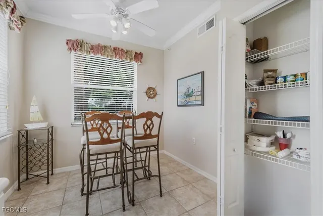 a kitchen with a sink a stove and cabinets