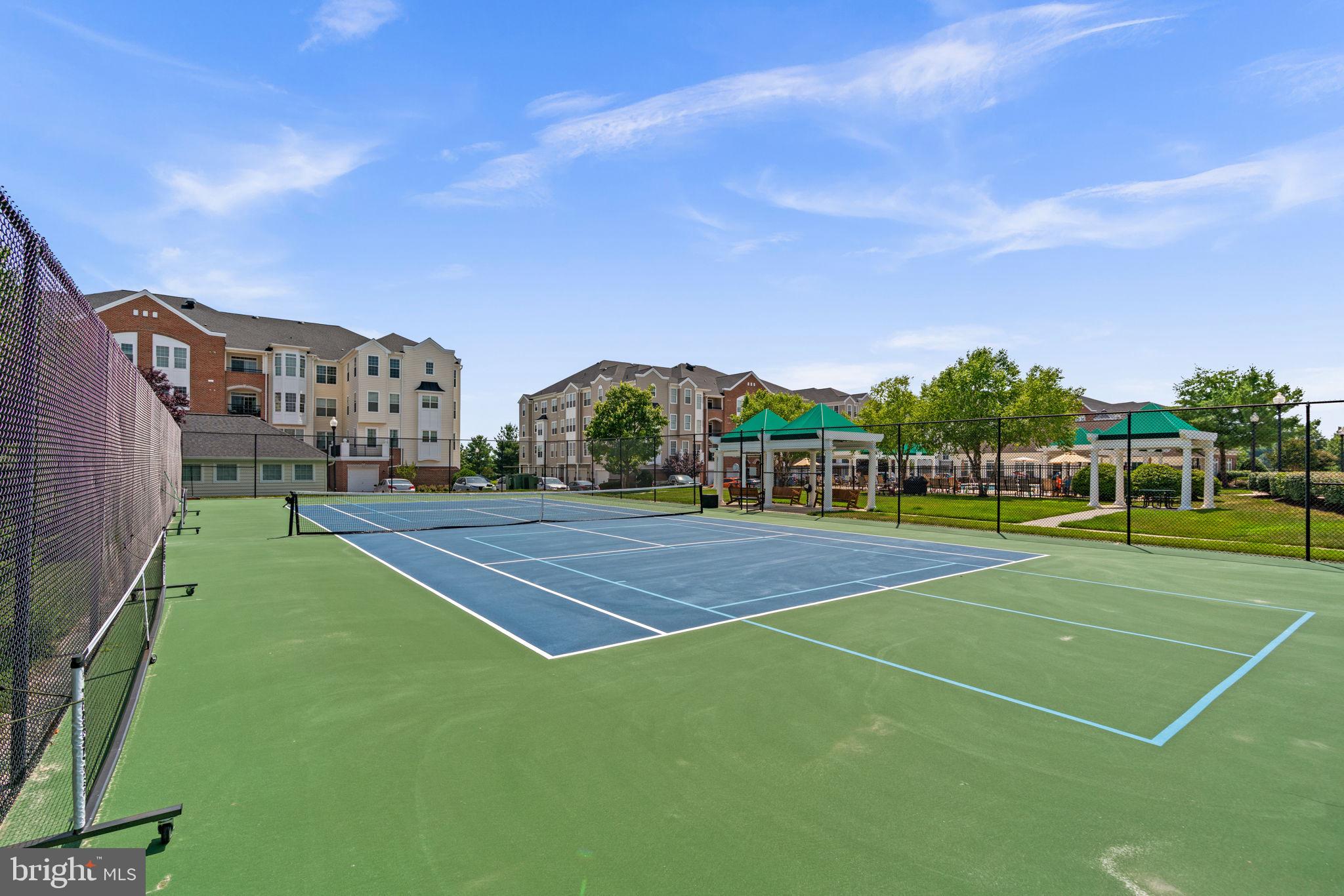 7315 Maplecrest Road, Unit 104 Elkridge, MD 21075 - Photo 48 of 58 a view of a tennis court