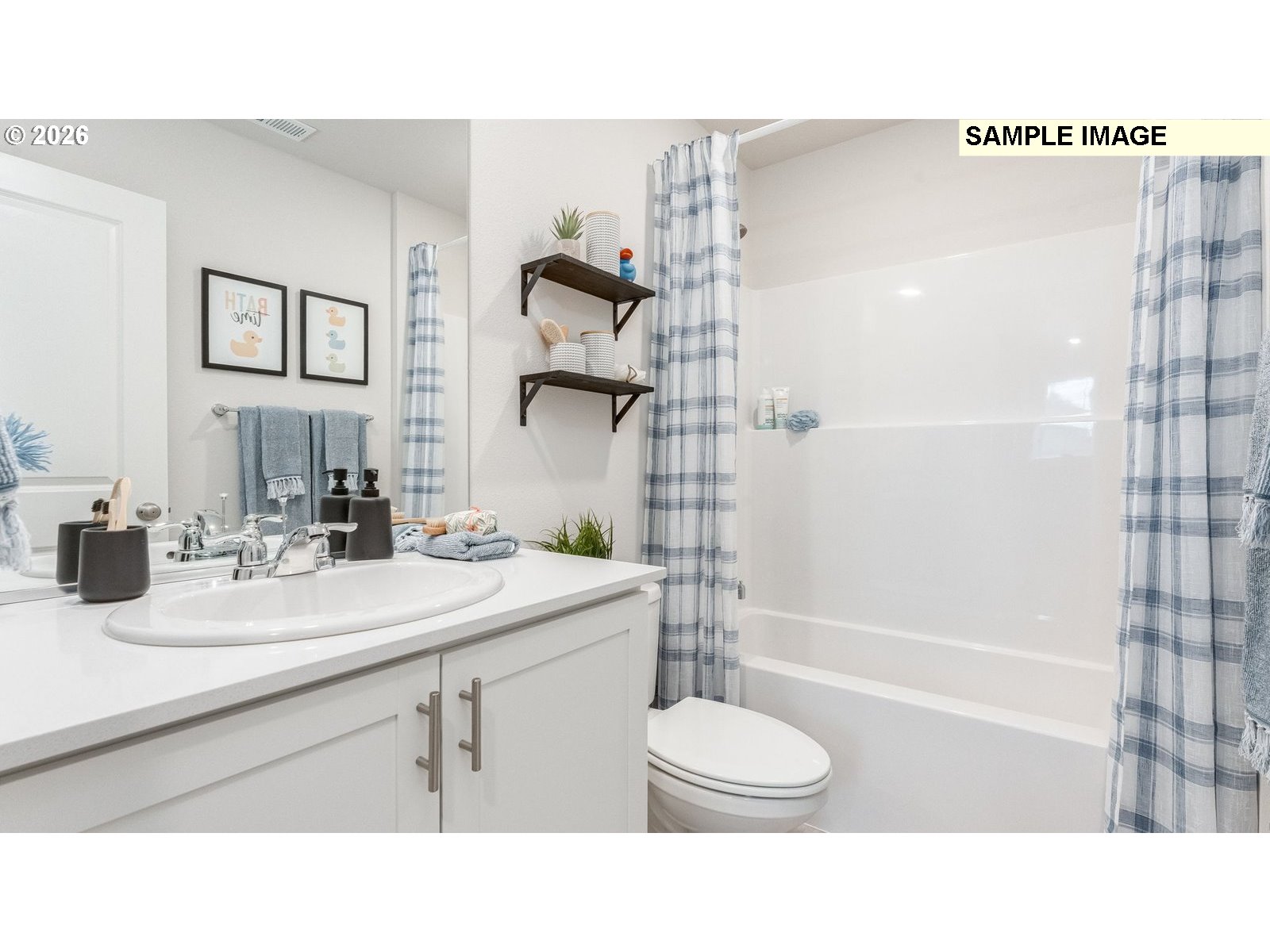 134 Coho Loop Woodland, WA 98674 - Photo 8 of 23 a bathroom with a sink a toilet and shower