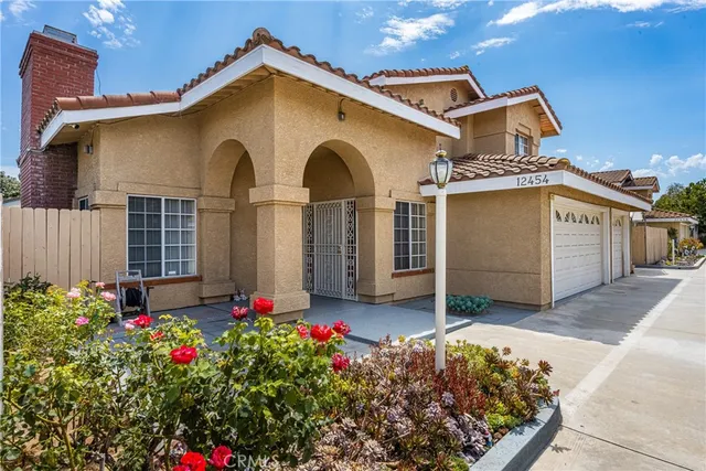 a front view of a house with a garage