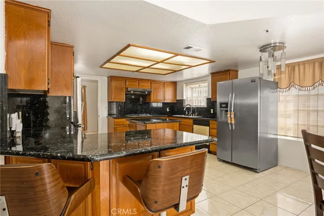 a bathroom with a sink mirror vanity and toilet