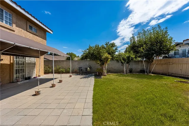 a bathroom with a sink mirror vanity and toilet