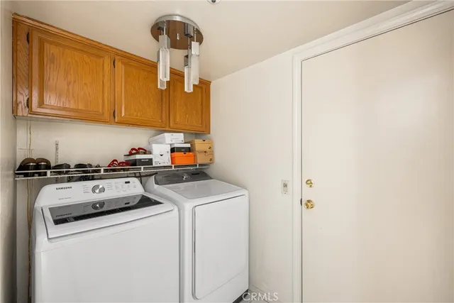 a view of a street with a building in the background