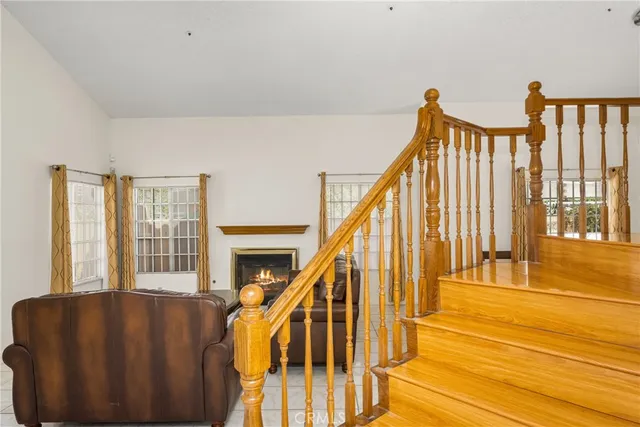 a view of a dining room with furniture and window