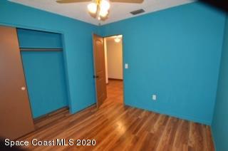 1554 Meadowbrook Road Northeast Palm Bay, FL 32905 - Photo 16 of 37 a view of a room with wooden floor