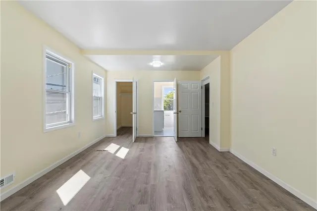 a view of livingroom with hardwood floor and window