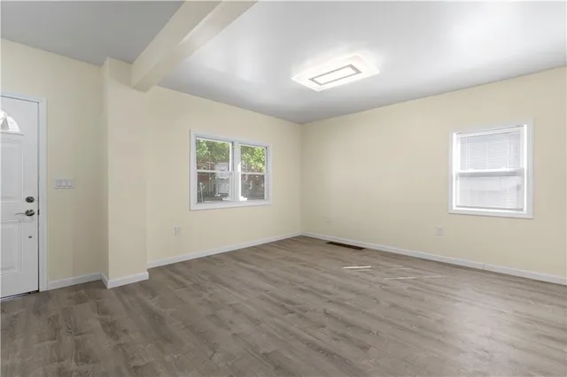 an empty room with windows