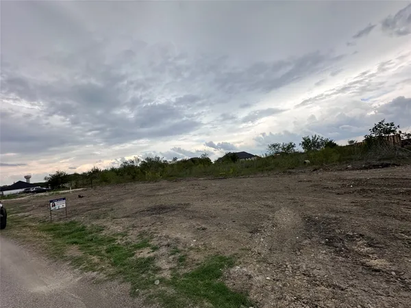 a view of a lake with mountain in the back