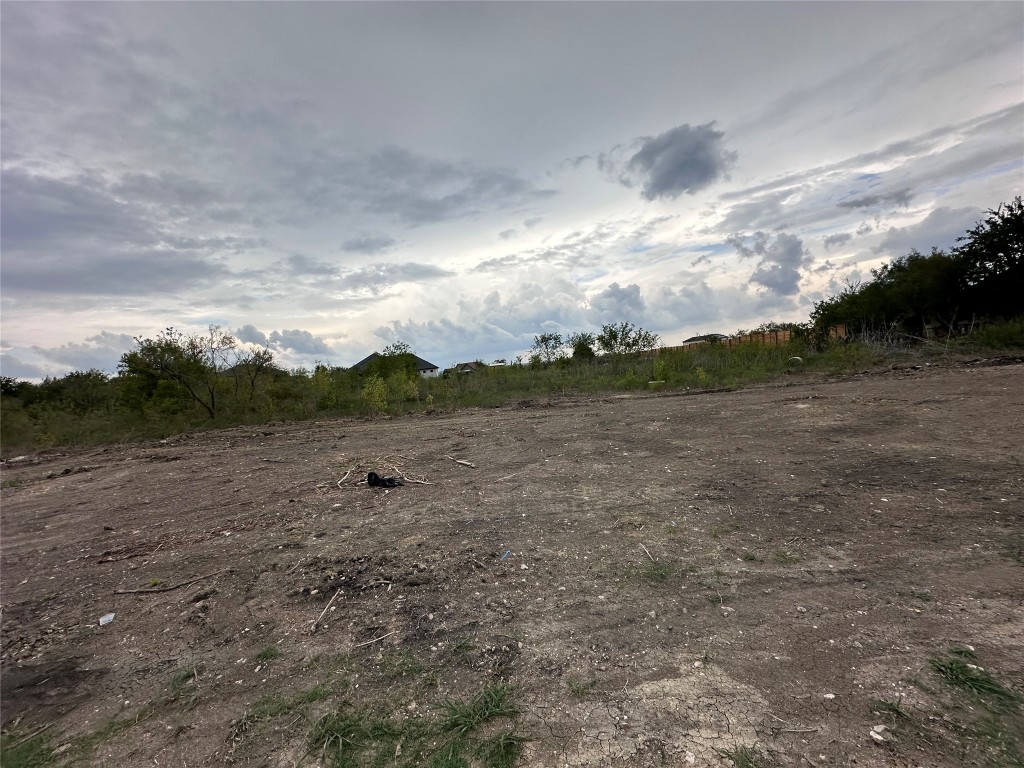 350 Engelke Road Niederwald, TX 78640 - Photo 6 of 9 a view of a lake with mountain in the back