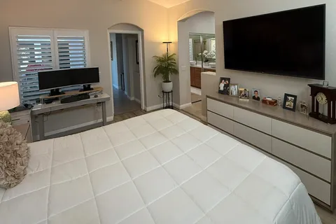 a bathroom with a sink a vanity and a mirror