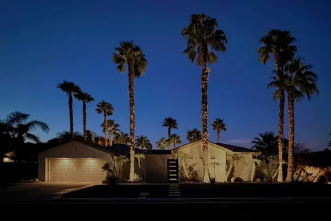 a view of a balcony with a potted plant