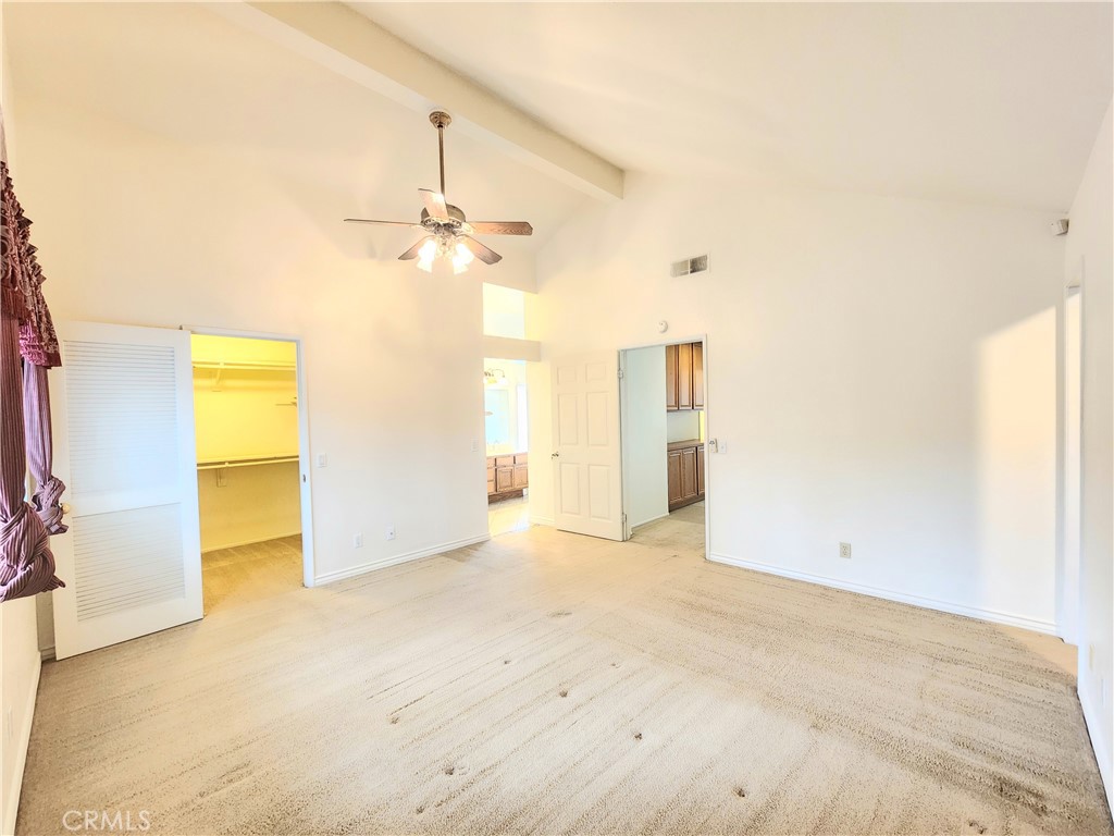 21029 Northview Drive Walnut, CA 91789 - Photo 13 of 22 a view of a big room with chandelier fan and windows